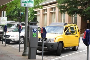 Downtown Decatur's parking meters are now electronic and take credit cards as well as coins. Photo by Lauren Ramsdell.