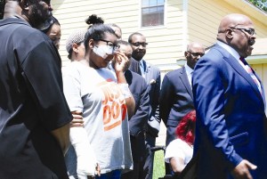 KenDarious’ mother, Tanyika Smith, was holding the baby as invaders shot her, her mother and a friend. KenDarious was killed. Photo by Lauren Ramsdell.